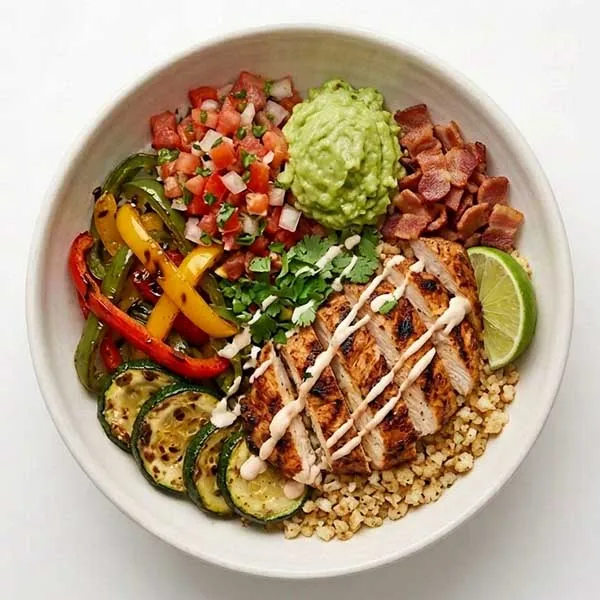 Mexican chicken fajita bowl with peppers and zucchini